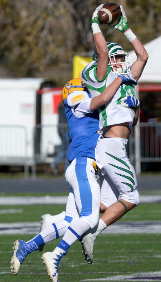 Steve Griffin / The Salt Lake Tribune


South Summit receiver Keegan Stracher leaps above San Juan defender as he hauls in a pass during class 2A semifinal football game against  at Stewart Stadium on the Weber State University campus in Ogden Thursday November 3, 2016.