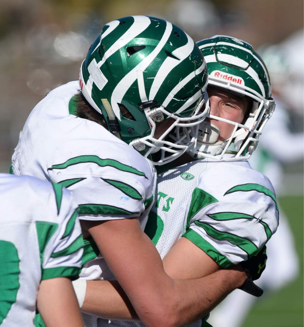 Steve Griffin / The Salt Lake Tribune


South Summit receiver Keegan Stracher gets mobbed by his teammates after scoring a receiving touchdown during class 2A semifinal football game against San Juan at Stewart Stadium on the Weber State University campus in Ogden Thursday November 3, 2016.