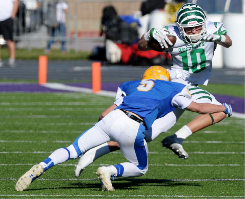 Steve Griffin / The Salt Lake Tribune


South Summit receiver Keegan Stracher gets brought down by San Juan defender Nathan Nielson during class 2A semifinal football game against  at Stewart Stadium on the Weber State University campus in Ogden Thursday November 3, 2016.