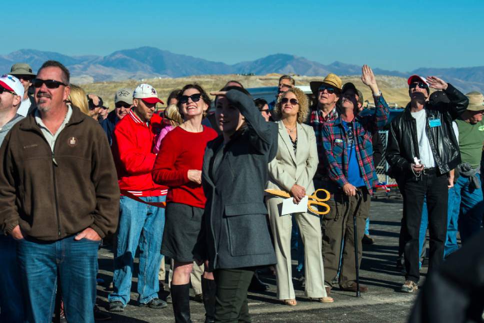 Chris Detrick  |  The Salt Lake Tribune
Salt Lake Mayor Jackie Biskupski, center, and other members of the public watch during the grand opening of the Salt Lake City Model Airplane Park,  7595 West California Avenue in Salt Lake City Wednesday November 2, 2016. The new airport includes ample runway space, at 60 feet wide and 550 feet long, and with a 10-foot shoulder on both sides. Amenities for RC hobbyists include a 35-foot concrete helipad and an expansive lay-down and set-up area. The airport space features seven shaded pavilions and a gravel parking area for 92 vehicles.