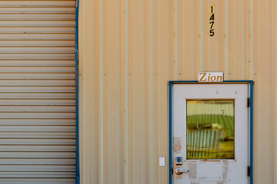 Trent Nelson  |  The Salt Lake Tribune
A sign reading "Zion" hangs over the door of an Industrial building on Lot 8, Hildale, Wednesday September 14, 2016.