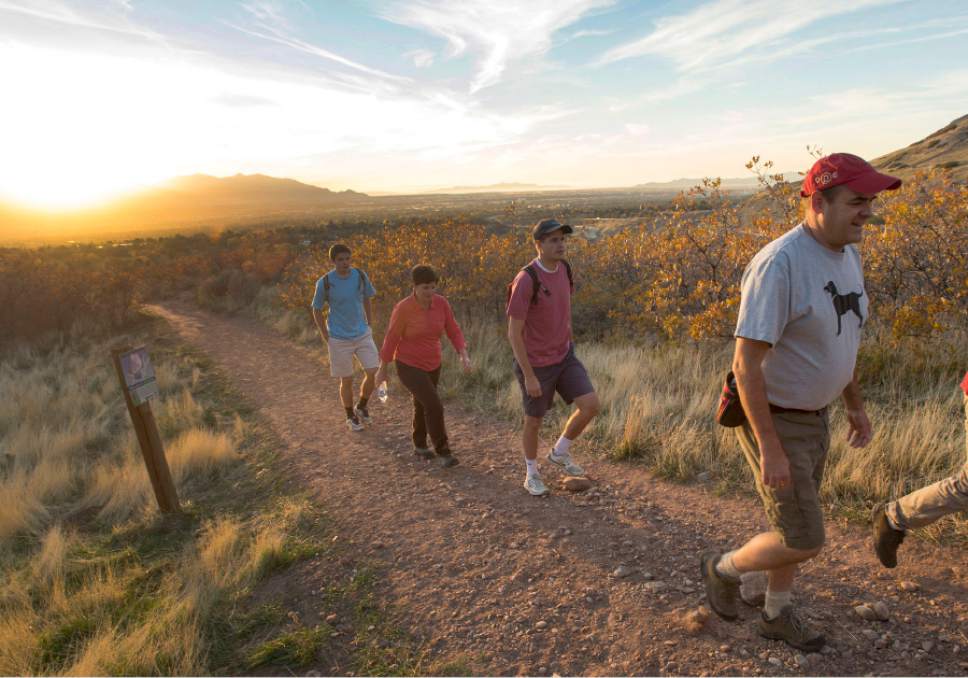 Rick Egan  |  The Salt Lake Tribune

Brian Anderson (right) takes a hike after work in the fading sunlight with his family along the shoreline trail, Thursday, October 23, 2014. Left to right, Jake, Sue, Nick, and Brian Anderson.