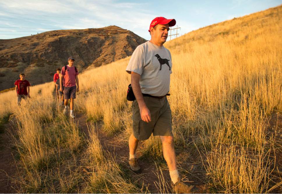 Rick Egan  |  The Salt Lake Tribune

Brian Anderson (right), takes a hike with his family after work along the shoreline trail, Thursday, October 23, 2014.
