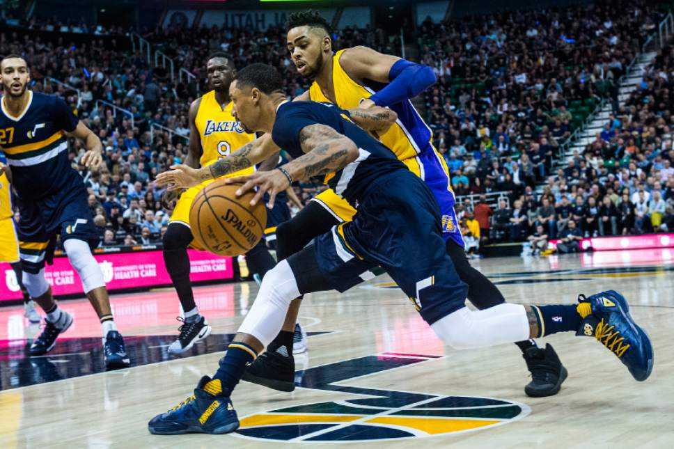 Chris Detrick  |  The Salt Lake Tribune
Utah Jazz guard George Hill (3) runs past Los Angeles Lakers guard D'Angelo Russell (1) during the game at Vivint Smart Home Arena Friday October 28, 2016.