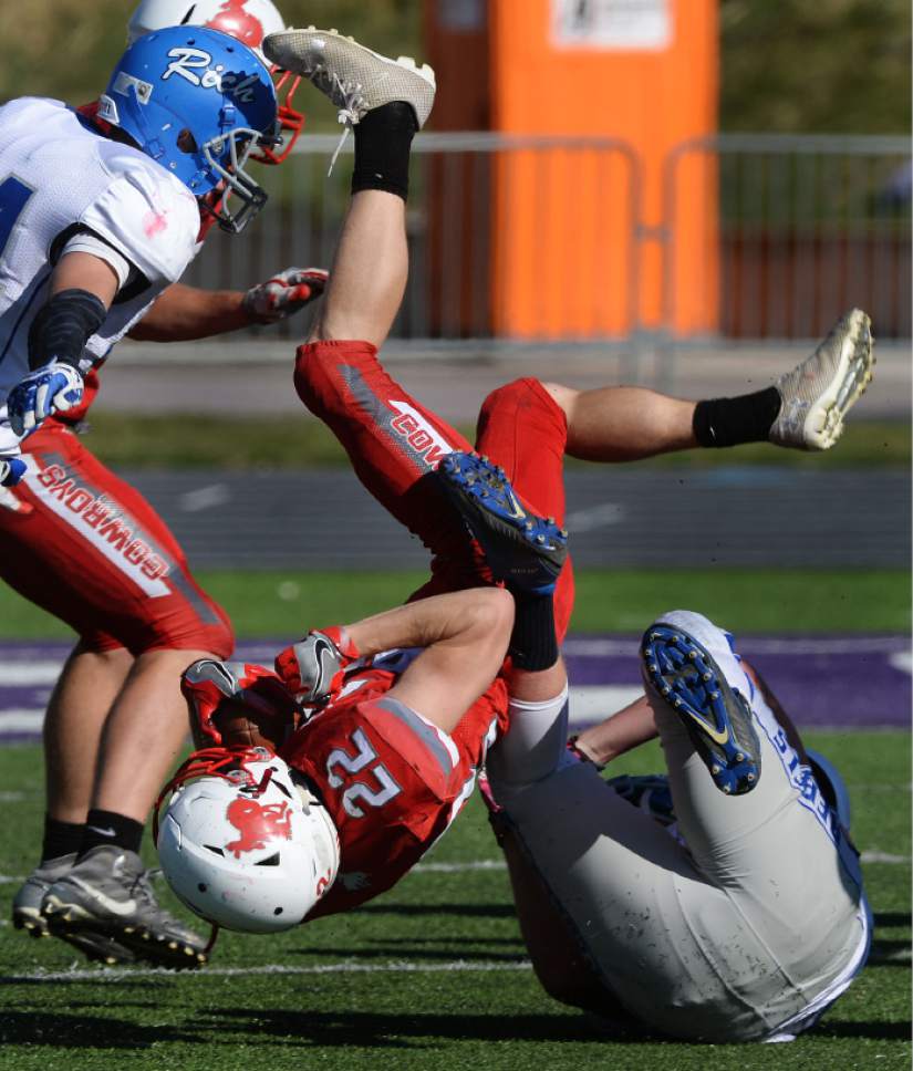 Steve Griffin / The Salt Lake Tribune


Kanab's Layne Anderson gets flipped into the air by Rich's Aaron Smith during the Class 1A semifinal game at Stewart Stadium on the Weber State University campus in Ogden Friday November 4, 2016.