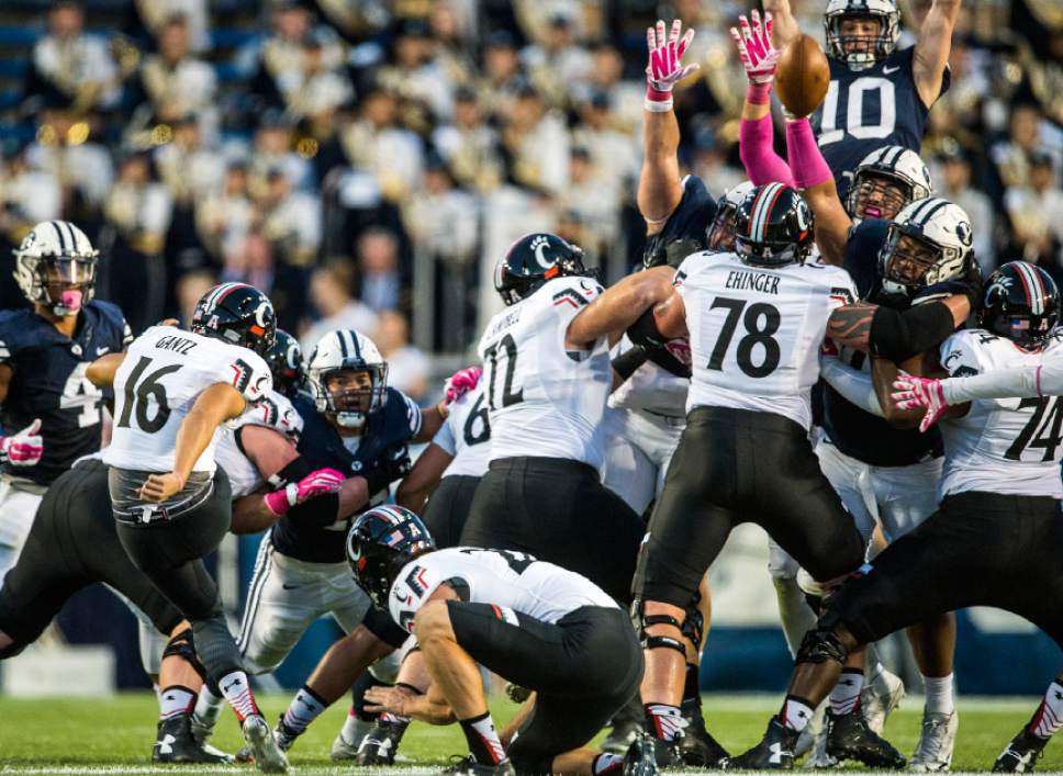 Chris Detrick  |  The Salt Lake Tribune
Brigham Young Cougars defense blocks a field goal attempt by Cincinnati Bearcats place kicker Andrew Gantz (16) during the game at LaVell Edwards Stadium Friday October 16, 2015.