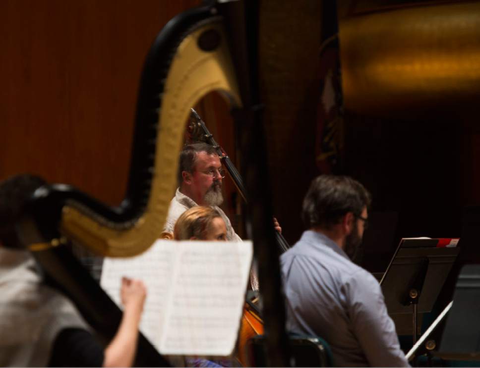 Steve Griffin / The Salt Lake Tribune

The NOVA Chamber Music Series will give the world premiere of a piccolo concerto written for the Utah Symphony's Caitlyn Valovick Moore by British composer Simon Holt. Here Thierry Fischer, who will will conduct the premiere, works with the musicians during rehearsal onstage in Abravanel Hall in Salt Lake City November 1, 2016.
