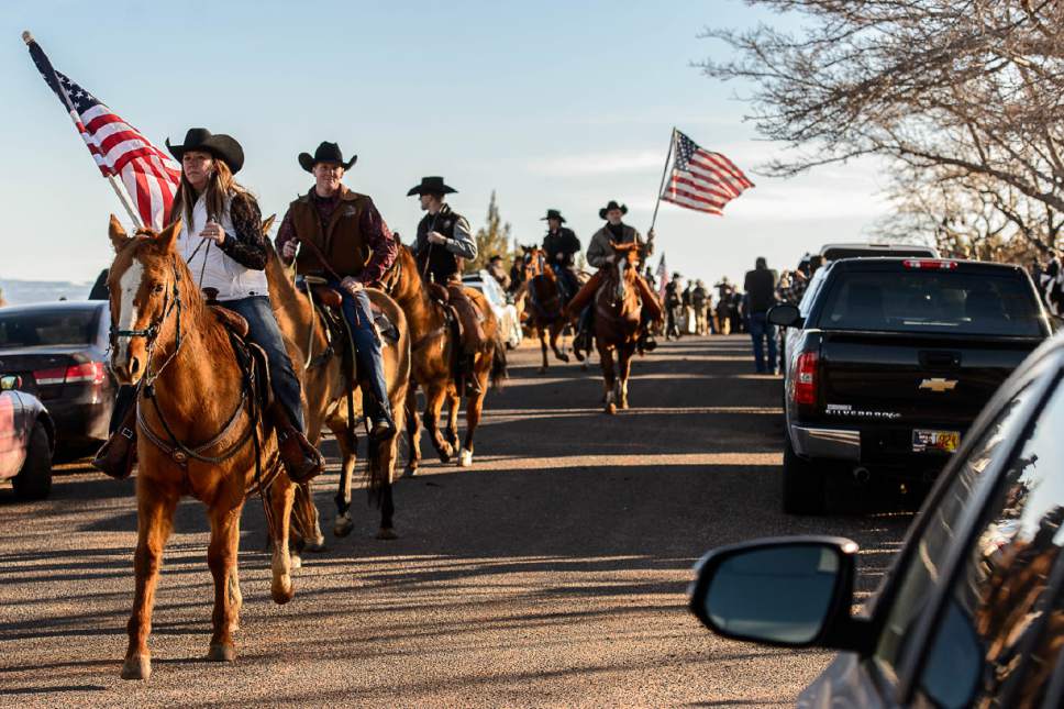 Trent Nelson  |  The Salt Lake Tribune
Riders on horseback ride in a procession following the funeral for Robert "LaVoy" Finicum, in Kanab, Friday February 5, 2016. Finicum was shot and killed by police during a January 26 traffic stop. Finicum was part of the armed occupation of an Oregon wildlife refuge.