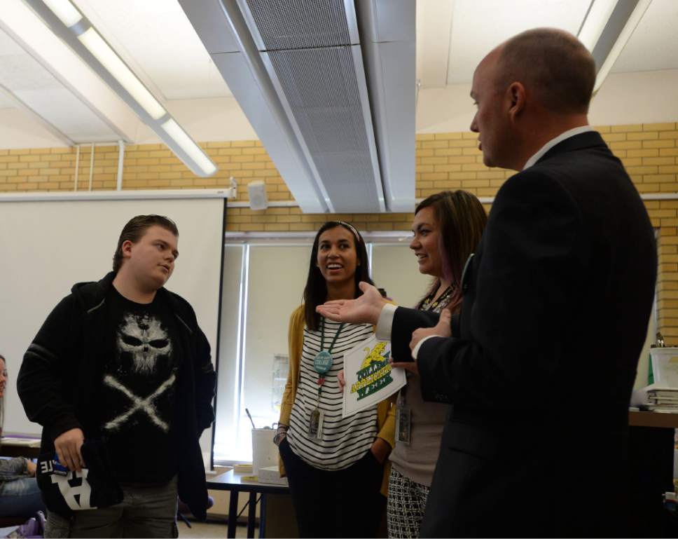 Steve Griffin / The Salt Lake Tribune


Kearns High School junior Tyler Turnbow, left, talks with Utah Lt. Governor Spencer Cox as he is announced as the winner of the Utah College Application Week logo contest at the high school n Kearns Monday November 7, 2016.