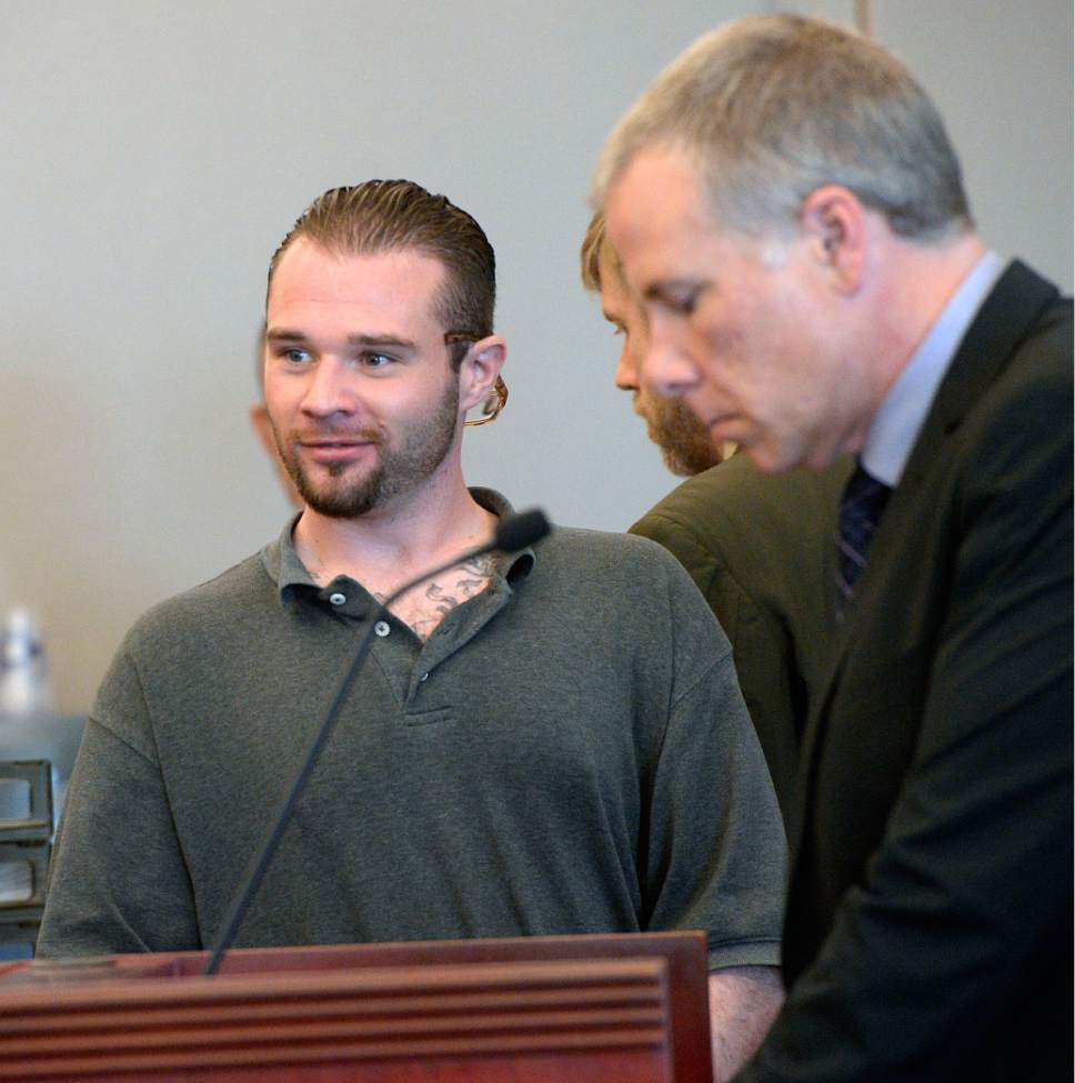 Al Hartmann  |  The Salt Lake Tribune
Brandon Beau Warren, 25, who is charged with killing Stevan Ryan Chambers and Shelli Marie Brown in Magna in August 2015 makes an initial court appearance in Judge Ann Boyden's court Monday Nov. 7. His defense lawyer Patrick Corum, right.