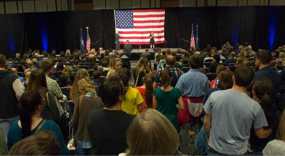 Rick Egan  |  The Salt Lake Tribune

Independent presidential candidate Evan McMullin and running mate Mindy Flinn appear at their election eve rally at Utah Valley Convention Center in Provo on Monday, Nov. 7, 2016.