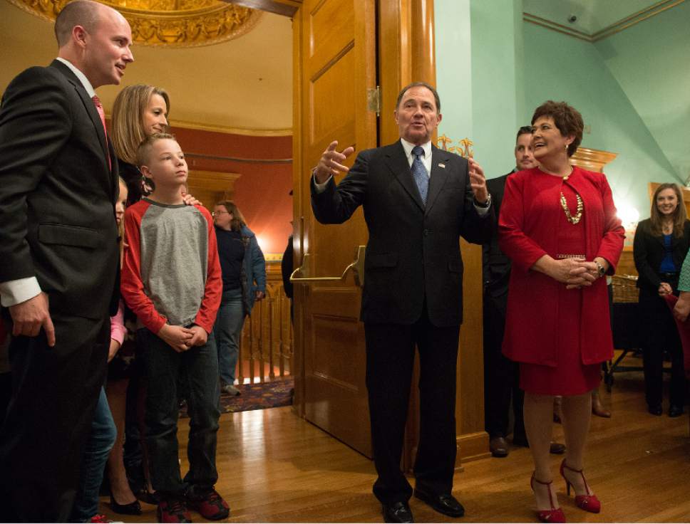 Leah Hogsten  |  The Salt Lake Tribune
Incumbent Republican Governor Gary Herbert shares a laugh with wife Jeanette (right) and Lt. Gov. Spencer Cox  and his family (left) prior to his acceptance speech after defeating former CHG Healthcare Services CEO Democrat nominee Mike Weinholtz to seize a third term in office.