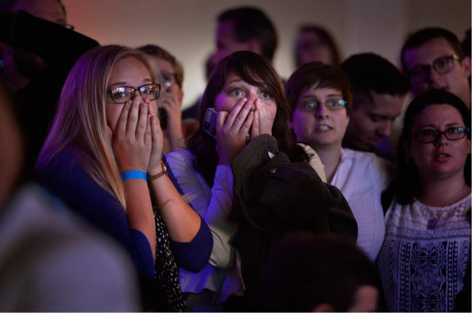 Scott Sommerdorf   |  The Salt Lake Tribune  
People in the audience at the Democratic election night party at the Sheraton Hotelon Tuesday react to the announcement that Donald Trump has carried another state.