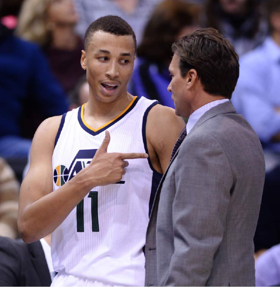 Steve Griffin / The Salt Lake Tribune


Utah Jazz guard Dante Exum (11) talks with Utah Jazz head coach Quin Snyder during game at Vivint Smart Home Arena in Salt Lake City Wednesday October 12, 2016.