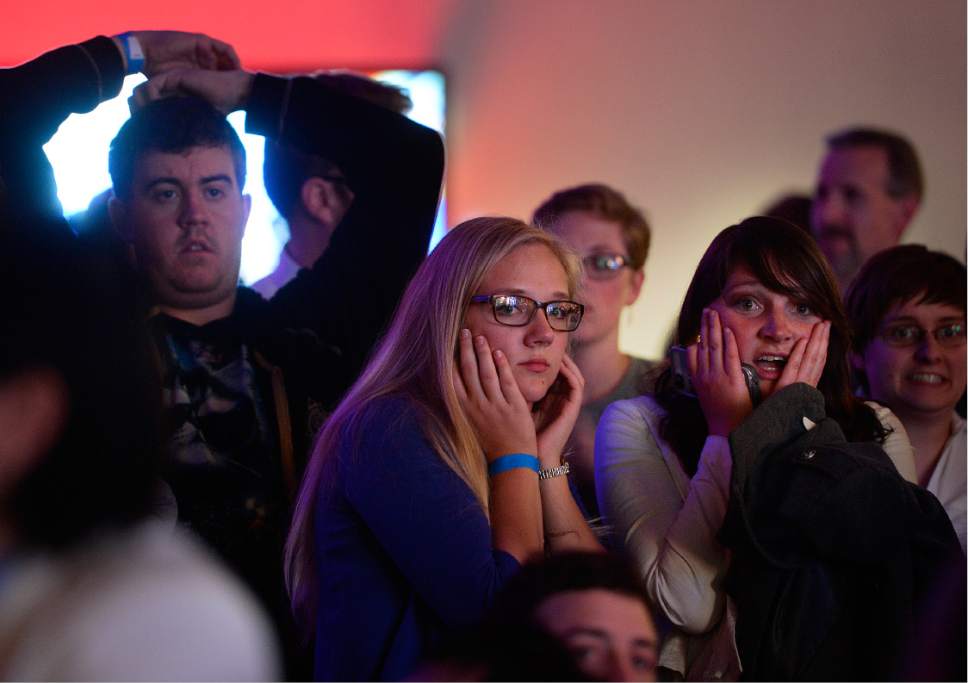 Scott Sommerdorf   |  The Salt Lake Tribune  
People in the audience at the Democratic election night party at the Sheraton Hotel react to the announcement that Donald Trump has carried another state, Tuesday, November 8, 2016.