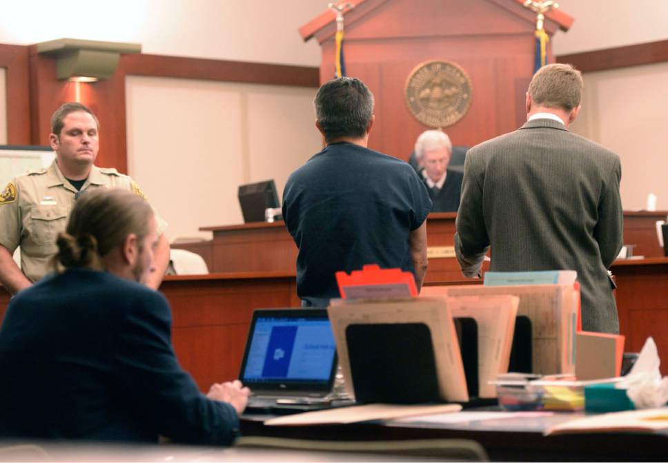 Al Hartmann  |  The Salt Lake Tribune
Larry Kent Graff, center,  makes his initial appearance Tuesday Dec. 30 in Judge Bruce Lubeck's court. Graff is charged with killing 26-year-old Candice Christina Melo on Dec. 18 in the driveway of Graff's Sandy home. Melo had been living at the home for about a week prior to the fatal episode.
