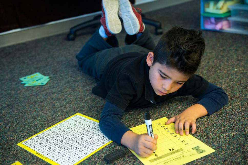 Chris Detrick  |  The Salt Lake Tribune
Yosgart Velasco works in Christi Paulson's second grade class at Riley Elementary School Wednesday November 9, 2016.