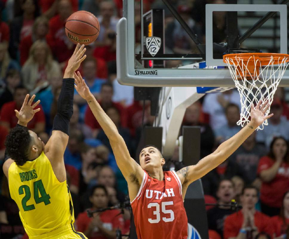 Rick Egan  |  The Salt Lake Tribune

Oregon Ducks forward Dillon Brooks (24) shoots over Utah Utes forward Kyle Kuzma (35), in the PAC-12 Basketball Championship game, The Utah Utes vs.The Oregon Ducks, at the MGM Arena, in Las Vegas, Friday, March 12, 2016.