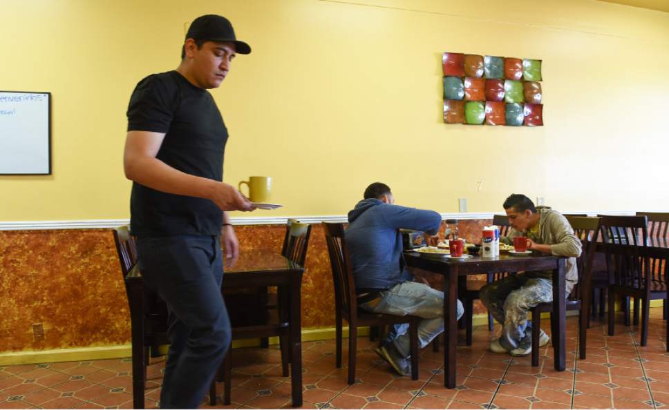Francisco Kjolseth | The Salt Lake Tribune
 Los Molcajetes in West Valley City has a large menu that offers everything from huevos rancheros to an overflowing lava rock molcajete full of a delicious green sauce, melted cheese, chicken, steak and shrimp.
