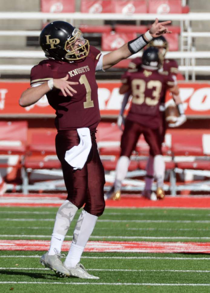 Steve Griffin / The Salt Lake Tribune


Lone Peak quarterback Dakota Hansen signals to the crowd after throwing a long touchdown pass during the 5A semifinal football game against American Fork' at Rice-Eccles Stadium on the University of Utah campus in Salt Lake City Thursday November 10, 2016.