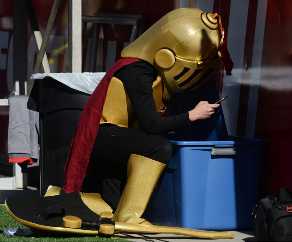 Steve Griffin / The Salt Lake Tribune


The Lone Peak Knight takes time out to check his phone during the 5A semifinal football game against American Fork at Rice-Eccles Stadium on the University of Utah campus in Salt Lake City Thursday November 10, 2016.