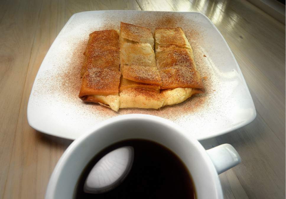 Scott Sommerdorf   |  The Salt Lake Tribune  
The Bougatsa (a traditional breakfast custard made from myzithra, crispy phyllo, cinnamon-sugar, for $10) with a cup of black coffee at Manoli's, a Greek small plates restaurant.
