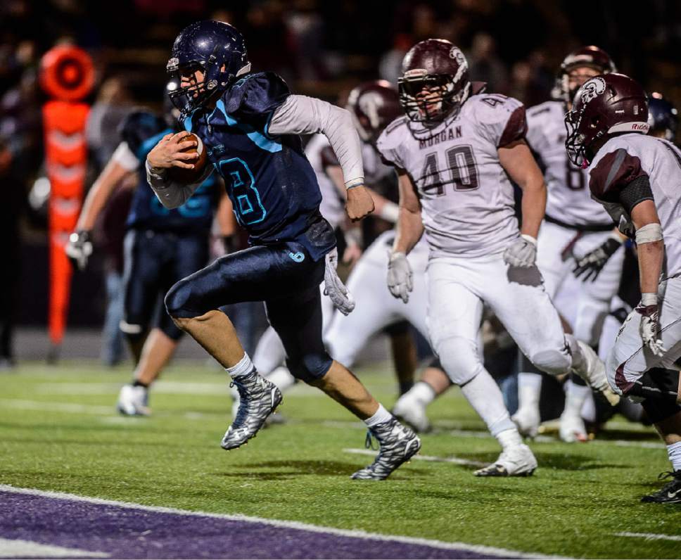 Trent Nelson  |  The Salt Lake Tribune
Juan Diego's Alexander Hoffman (18) scores a touchdown as Juan Diego defeats Morgan in the 3A high school football championship game at Weber State in Ogden, Saturday November 14, 2015.