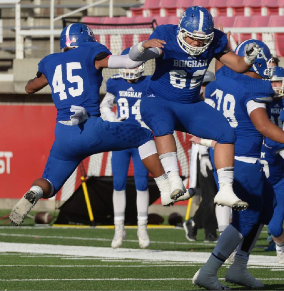 Steve Griffin / The Salt Lake Tribune


Bingham's Kai Fotu and Camden Brown celebrate a Miner interception during the 5A semifinal football game against  Fremont at Rice-Eccles Stadium on the University of Utah campus in Salt Lake City Thursday November 10, 2016.