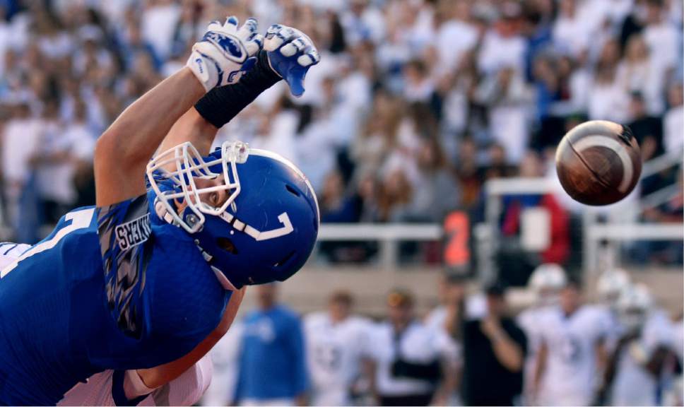 Steve Griffin / The Salt Lake Tribune


Bingham running back Noah Stanger can't hang on to a pass during the 5A semifinal football game against Fremont at Rice-Eccles Stadium on the University of Utah campus in Salt Lake City Thursday November 10, 2016.