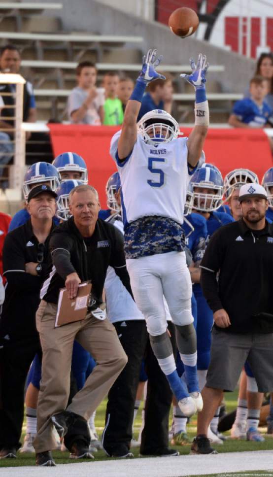 Steve Griffin / The Salt Lake Tribune


Fremont receiver Spencer Bankhead makes a leaping catch in front of the Bingham bench during the 5A semifinal football game at Rice-Eccles Stadium on the University of Utah campus in Salt Lake City Thursday November 10, 2016.