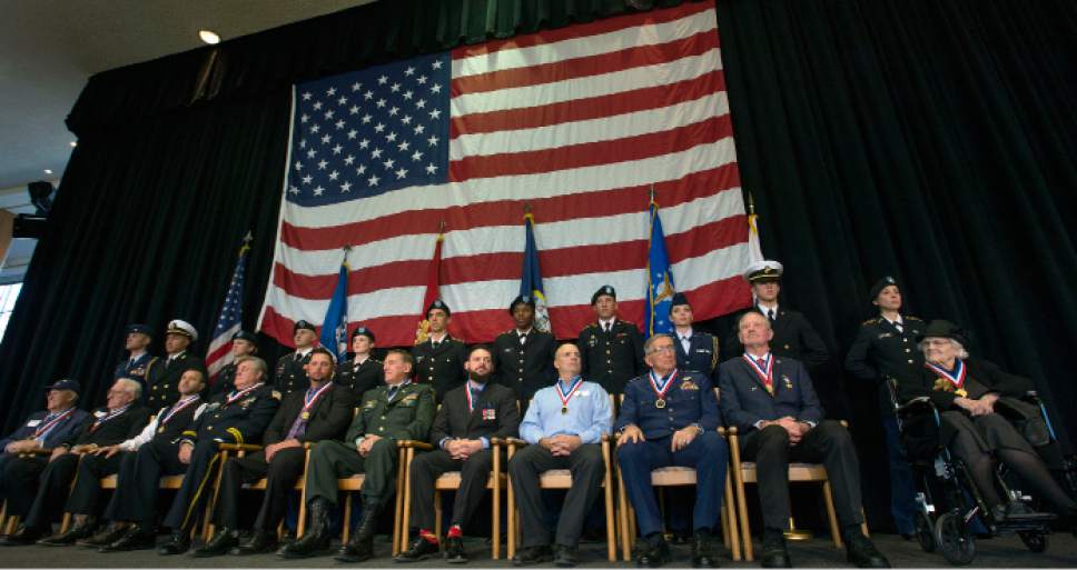 Steve Griffin / The Salt Lake Tribune


Members of the University of Utah ROTC stand with the 11 honorees in this year's Veteran's Day Ceremony in the ballroom of the Union Building on the University of Utah campus in Salt Lake City Friday November 11, 2016.