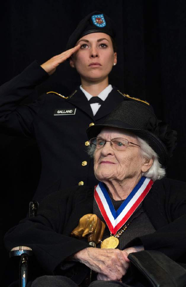 Steve Griffin / The Salt Lake Tribune


University of Utah Army ROTC Cadet Corinne Galland salutes as Donna Mecham is honored during the University of Utah Veteran's Day Ceremony in the ballroom of the Union Building on the University of Utah campus in Salt Lake City Friday November 11, 2016. First Lieutenant Mecham grew up in rural Michigan and began her Army nursing career in 1943 in North Africa.