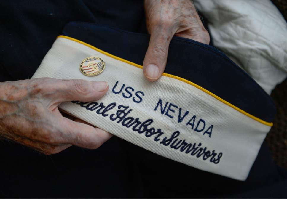 Francisco Kjolseth | The Salt Lake Tribune
Max Burggraaf, 98, one of Utah's last Pearl Harbor survivors, shares a few memories of the fateful day in 1941 as a crew member aboard the USS Nevada. On his hat is a pin marking the 70th anniversary of Pearl Harbor. Burggraaf who was a 1st class electrician now lives in a retirement home in South Jordan.