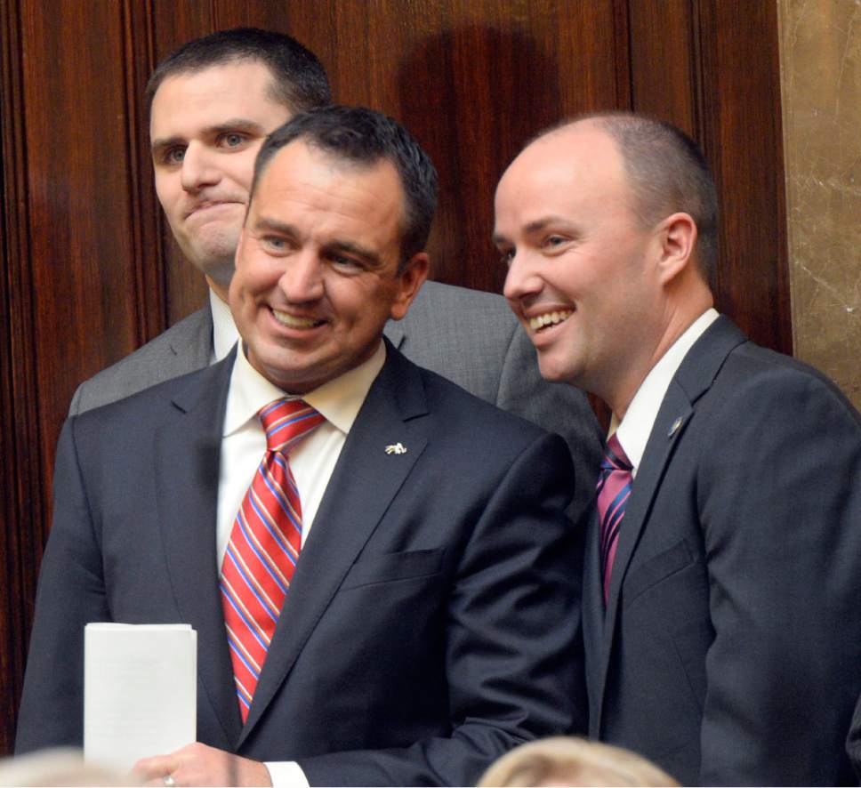 Al Hartmann  |  The Salt Lake Tribune
Soon to become Speaker of the House Greg Hughes, left, chats with Utah Lt. Gov. Spencer Cox at the back door of the House of Representatives before taking take the oath of office at the start of the 2015 legislative session Monday Jan 26, 2015.