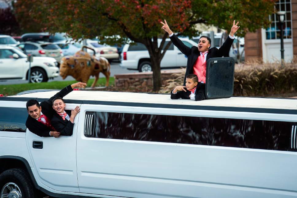 Chris Detrick  |  The Salt Lake Tribune
Men in a Hummer limousine yell anti-Trump slogans as they drive by the Utah State Capitol during the 'Salt Lake City Protests Trump' event Saturday November 12, 2016.