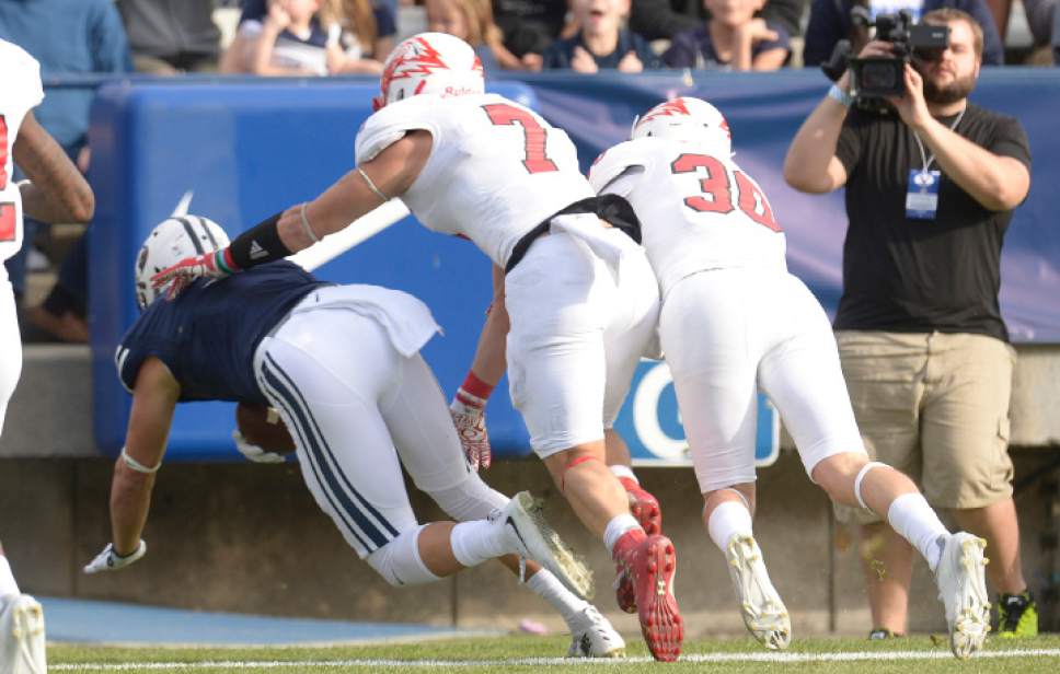 Leah Hogsten  |  The Salt Lake Tribune
Brigham Young Cougars wide receiver Colby Pearson (3) with the touchdown. Brigham Young University leads Southern Utah University 31-7 during their first match up at LaVell Edwards Stadium,  Saturday, November 12, 2016.