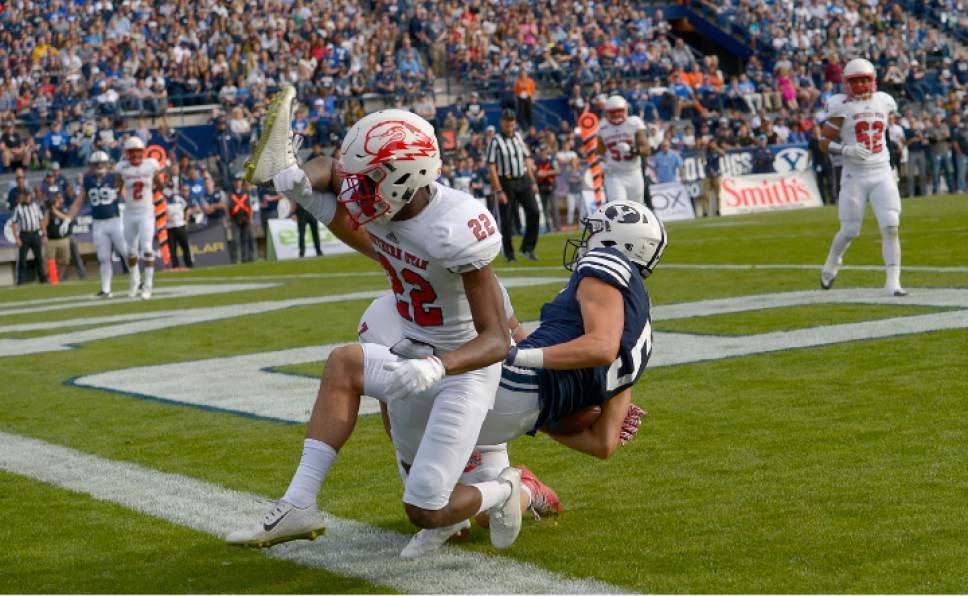 Leah Hogsten  |  The Salt Lake Tribune
Brigham Young Cougars wide receiver Nick Kurtz (5) catches the pass but is pushed out of the end zone. Brigham Young University leads Southern Utah University 31-7 during their first match up at LaVell Edwards Stadium,  Saturday, November 12, 2016.