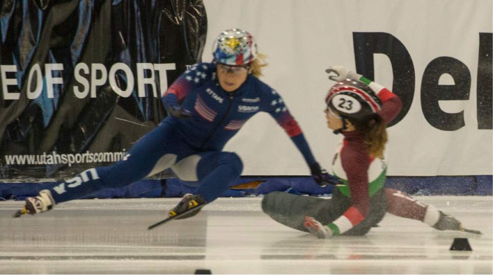 Rick Egan  |  The Salt Lake Tribune

Jesica Koorman, USA, and Petra Jazapati, Hungry, collide in the in the Ladies World Cup1500 M finals, at the Olympic Oval in Kearns, Saturday, November 12, 2016.