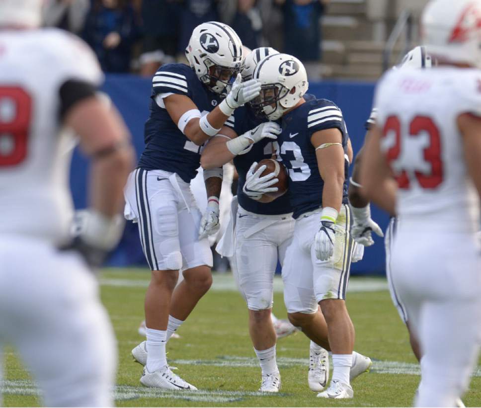 Leah Hogsten  |  The Salt Lake Tribune
Brigham Young Cougars defensive back Eric Takenaka (33) celebrates after his interception. Brigham Young University defeated Southern Utah University 37-7 during their first match up at LaVell Edwards Stadium,  Saturday, November 12, 2016.