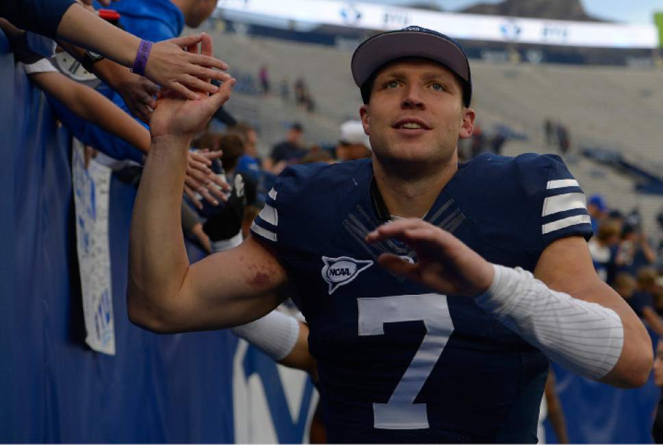 Leah Hogsten  |  The Salt Lake Tribune
Brigham Young Cougars quarterback Taysom Hill (7) celebrates with fans. Brigham Young University defeated Southern Utah University 37-7 during their first match up at LaVell Edwards Stadium,  Saturday, November 12, 2016.