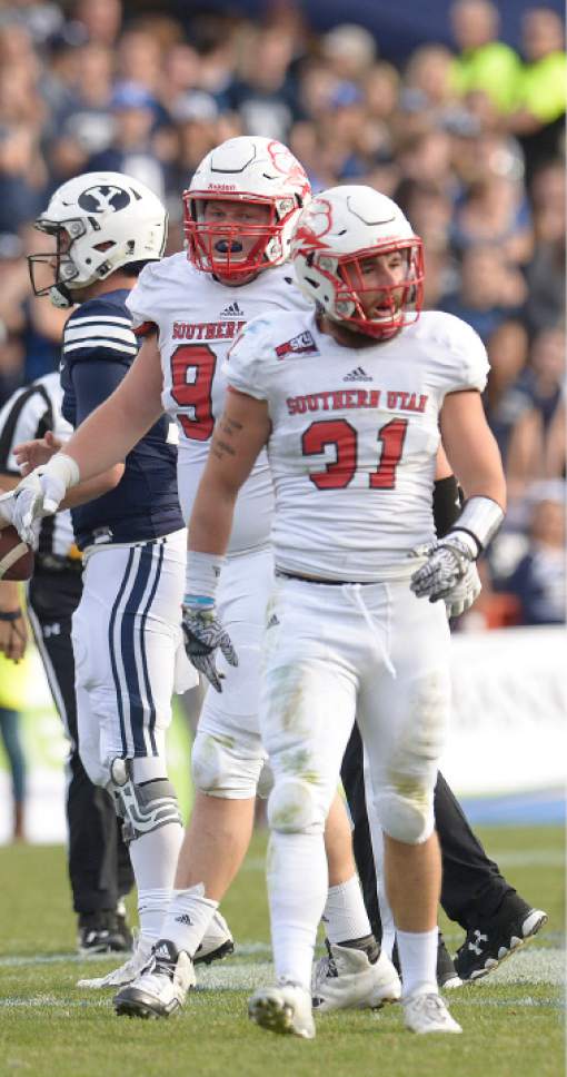 Leah Hogsten  |  The Salt Lake Tribune
Southern Utah Thunderbirds safety Mitch Dalley (31) celebrates his sack on Brigham Young Cougars quarterback Tanner Mangum (12). Brigham Young University defeated Southern Utah University 37-7 during their first match up at LaVell Edwards Stadium,  Saturday, November 12, 2016.