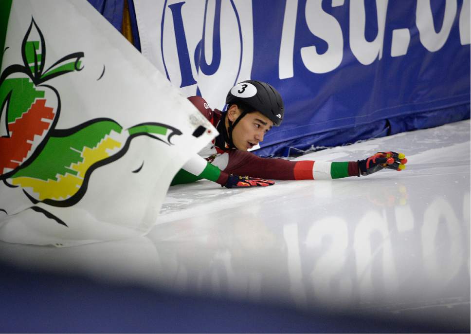 Scott Sommerdorf   |  The Salt Lake Tribune  
Sandor Liu Shaolin of Hungary comes to rest inside the padding after a fall in the Men's 500m semifinal heat 2 at the World Cup Short Track race at the Utah Olympic Oval, Sunday, November 13, 2016.
