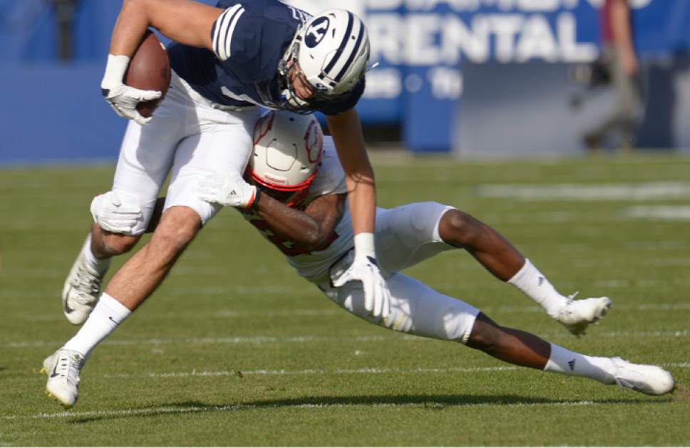 Leah Hogsten  |  The Salt Lake Tribune
Brigham Young Cougars wide receiver Nick Kurtz (5) makes the first down before getting tackled by Southern Utah Thunderbirds cornerback Emmanuel Roker (22). Brigham Young University leads Southern Utah University 31-7 during their first match up at LaVell Edwards Stadium,  Saturday, November 12, 2016.
