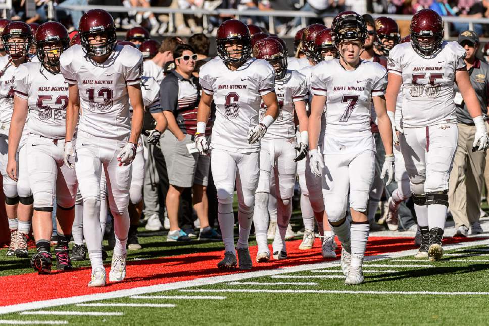 Trent Nelson  |  The Salt Lake Tribune
Maple Mountain players at halftime, behind by fifty points, as East faces Maple Mountain in a 4A semifinal high school football game at Rice-Eccles Stadium in Salt Lake City, Friday November 11, 2016.