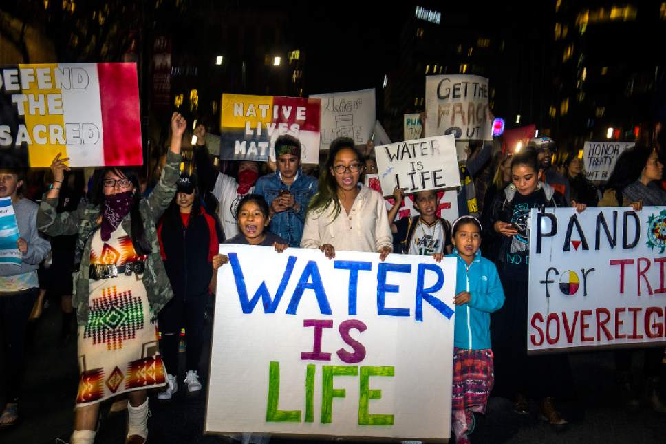 Chris Detrick  |  The Salt Lake Tribune
Dakota Access Pipeline protestors march in solidarity on State Street during the 'Standing Rock Solidarity Pack-In' Tuesday November 15, 2016.