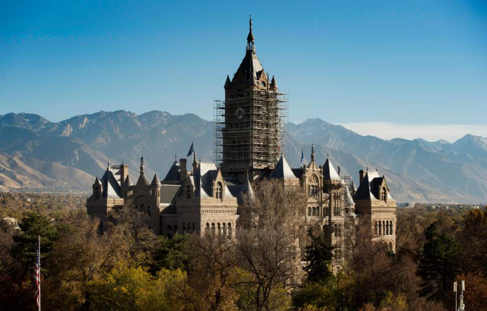 Rick Egan  |  The Salt Lake Tribune

Scaffolding removal has started at the Salt Lake City and County Building upper tower, Monday, November 14, 2016.