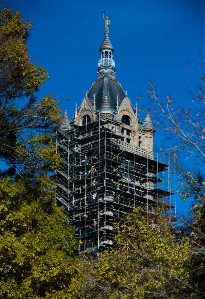 Rick Egan  |  The Salt Lake Tribune

Scaffolding removal has started at the Salt Lake City and County Building upper tower, Monday, November 14, 2016.
