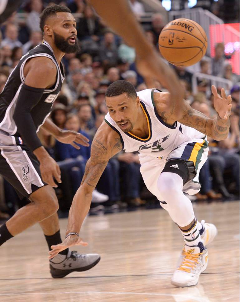 Leah Hogsten  |  The Salt Lake Tribune
Utah Jazz guard George Hill (3) is fouled by San Antonio Spurs guard Patty Mills (8). The San Antonio Spurs lead the Utah Jazz     53-41 during their game, Friday, November 4, 2016 at Vivant Smart Home Arena.