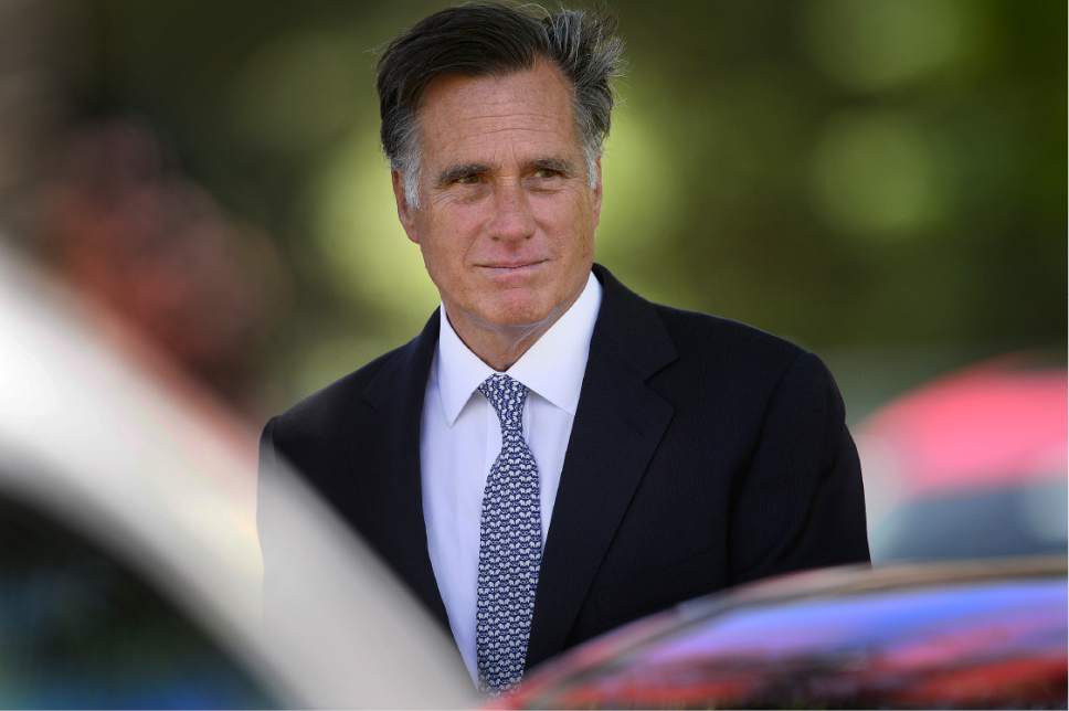 Scott Sommerdorf   |  The Salt Lake Tribune  
Mitt Romney leaves the funeral services for former U.S. Senator Bob Bennett. Interment was at the Salt Lake City Cemetery, Saturday, May 14, 2016.