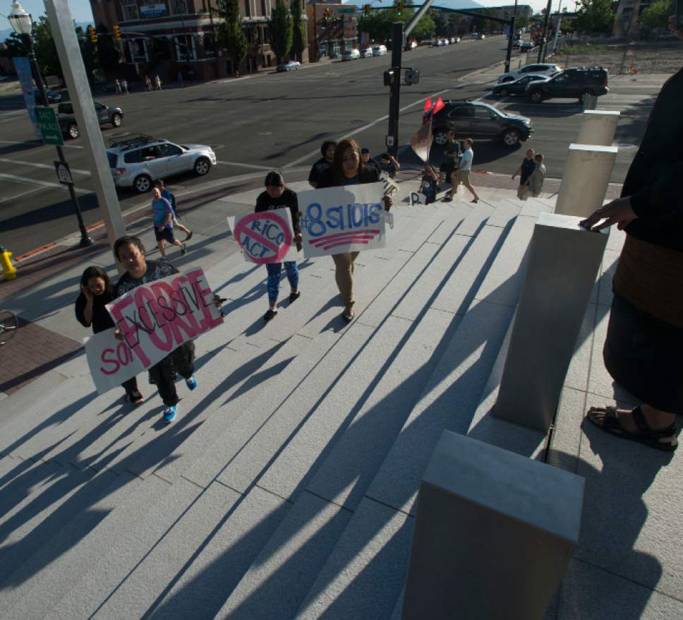 Steve Griffin  |  The Salt Lake Tribune


Family, friends, and supporters of, Siale Angilau, who was shot and killed in the Salt Lake City federal courthouse, gather for the Justice4Siale Vigil on the courthouse plaza in Salt Lake City, Utah Wednesday, June 11, 2014.  Glendale community members have organized a coalition called the "Raise your Pen Coalition."